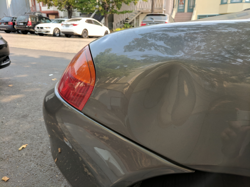 Illustration for article titled Stumbling Asshole Caught On Video Denting A Street-Parked Porsche